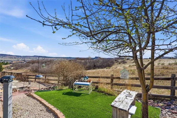a view of roof deck with patio