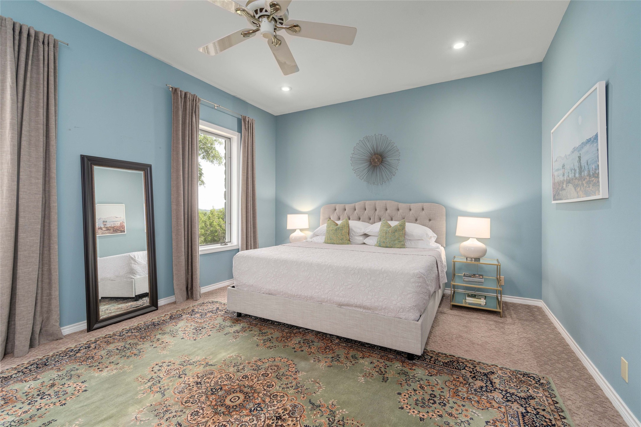 2102 Paisano Road Austin, TX 78746 - Photo 23 of 26 Carpeted bedroom featuring ceiling fan and recessed lighting