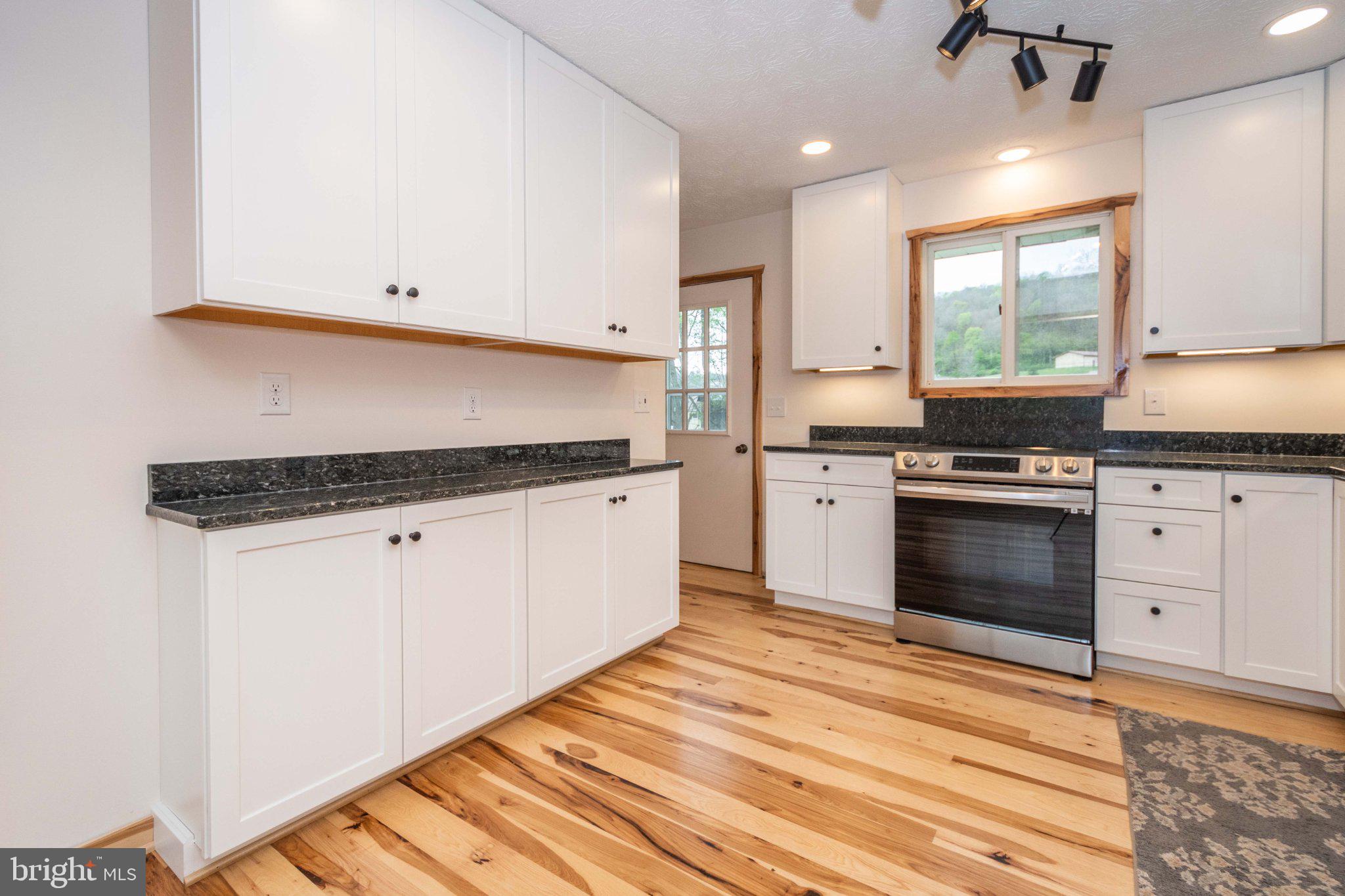 2155 Jennings Road Grantsville, MD 21536 - Photo 14 of 39 Modern kitchen with sleek finishes.