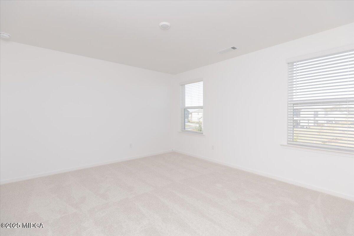 218 Hickory Rdg Trail Kathleen, GA 31047 - Photo 31 of 48 an empty room with windows