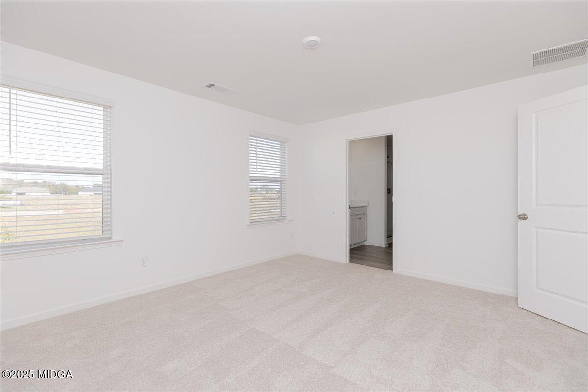 218 Hickory Rdg Trail Kathleen, GA 31047 - Photo 32 of 48 a view of an empty room with a window