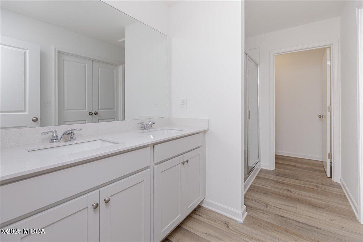 218 Hickory Rdg Trail Kathleen, GA 31047 - Photo 34 of 48 a bathroom with a sink and a mirror