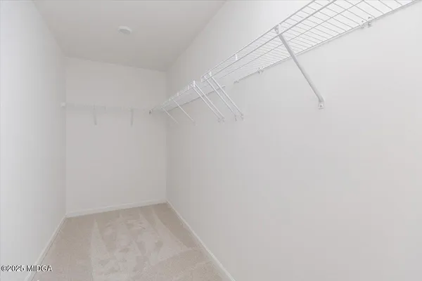 a view of a room with racks on the wall