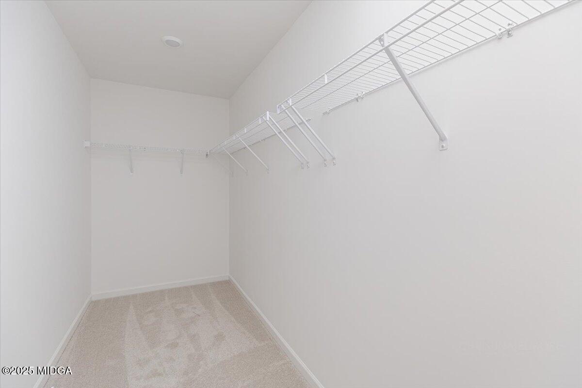 218 Hickory Rdg Trail Kathleen, GA 31047 - Photo 36 of 48 a view of a room with racks on the wall