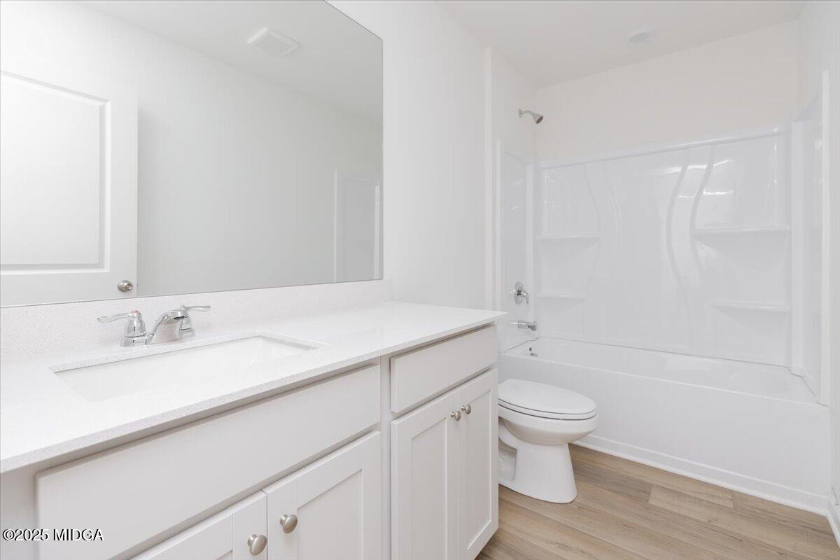 218 Hickory Rdg Trail Kathleen, GA 31047 - Photo 39 of 48 a bathroom with a granite countertop sink toilet and shower