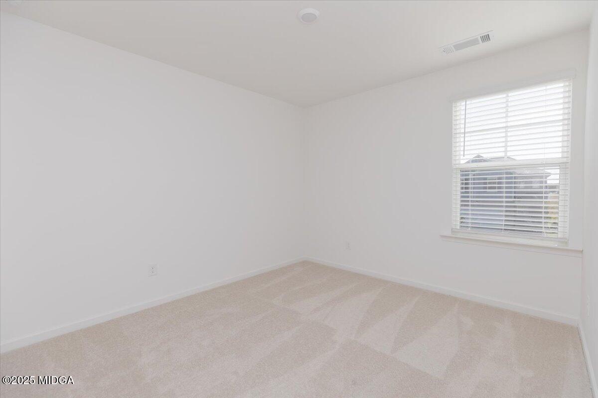 218 Hickory Rdg Trail Kathleen, GA 31047 - Photo 40 of 48 an empty room with a window