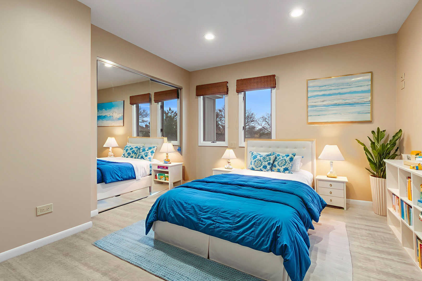 825 Downing Street Northbrook, IL 60062 - Photo 21 of 29 a bedroom with a large bed and a potted plant