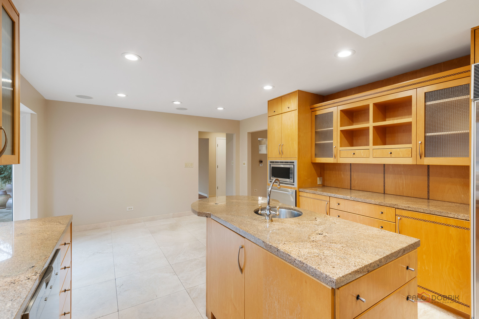 825 Downing Street Northbrook, IL 60062 - Photo 6 of 29 a kitchen with a sink stove and cabinets