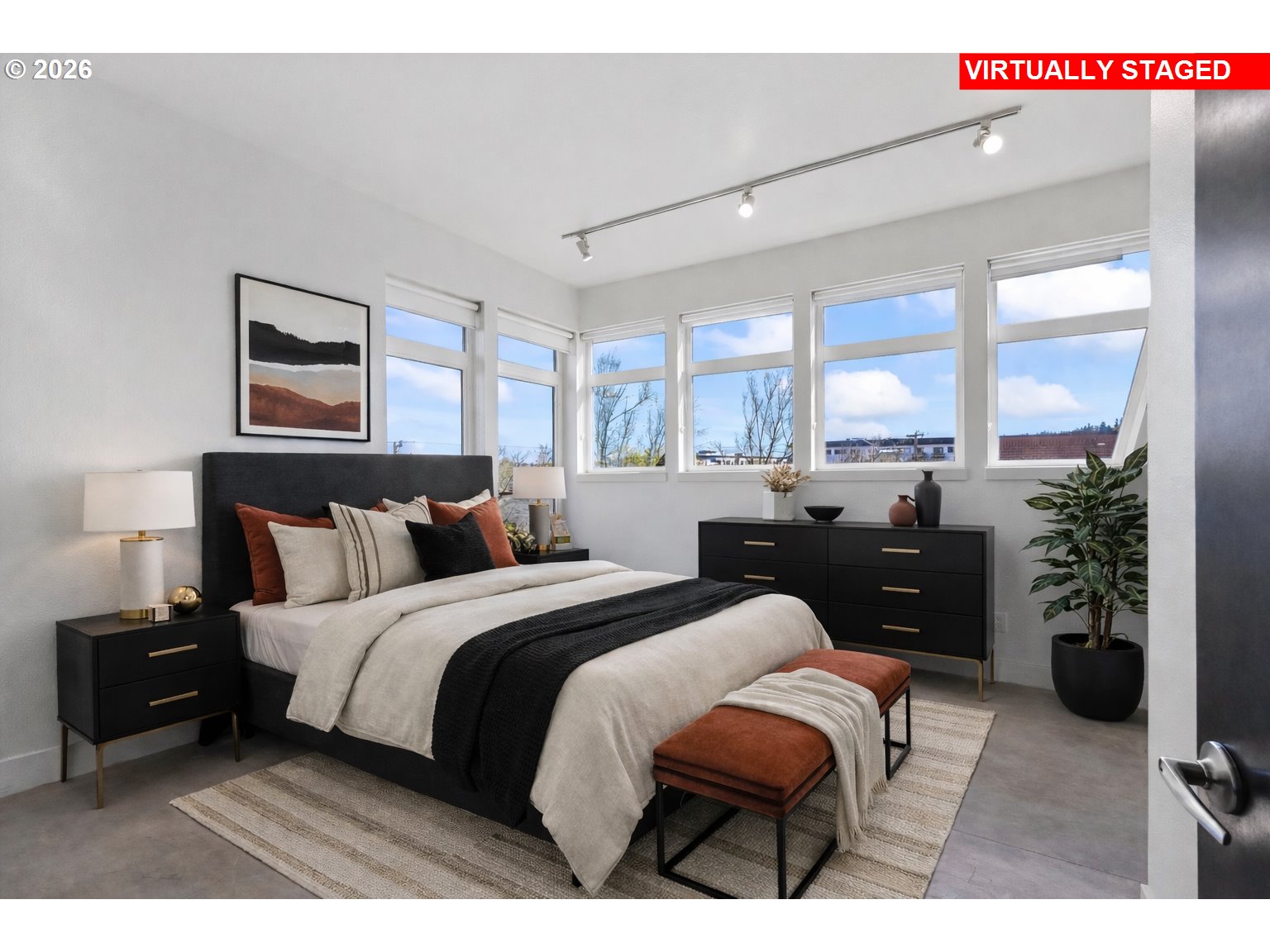 4644 South Kelly Avenue Portland, OR 97239 - Photo 15 of 42 a bedroom with a bed window and couch