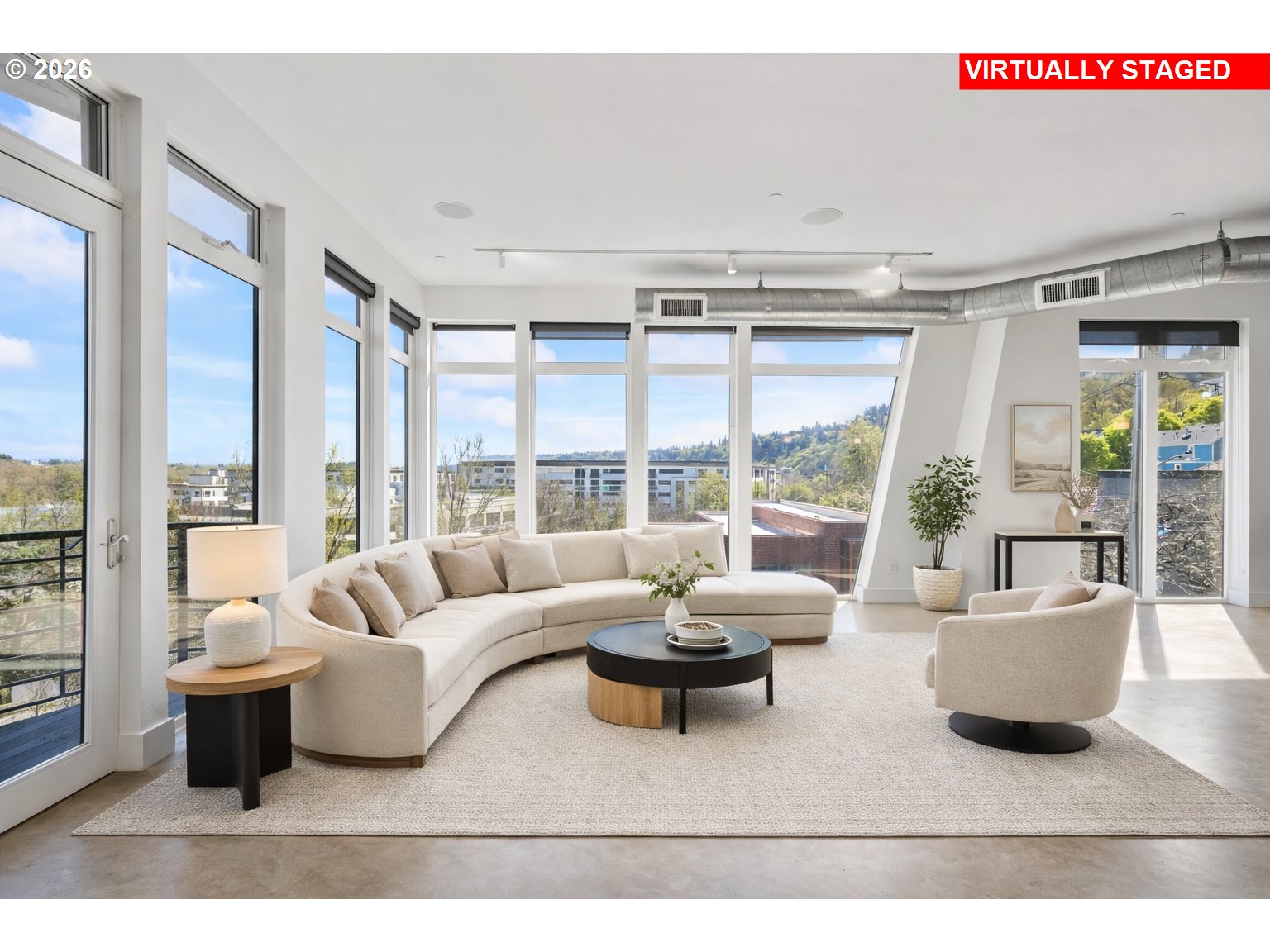 4644 South Kelly Avenue Portland, OR 97239 - Photo 2 of 42 a living room with furniture and a large window