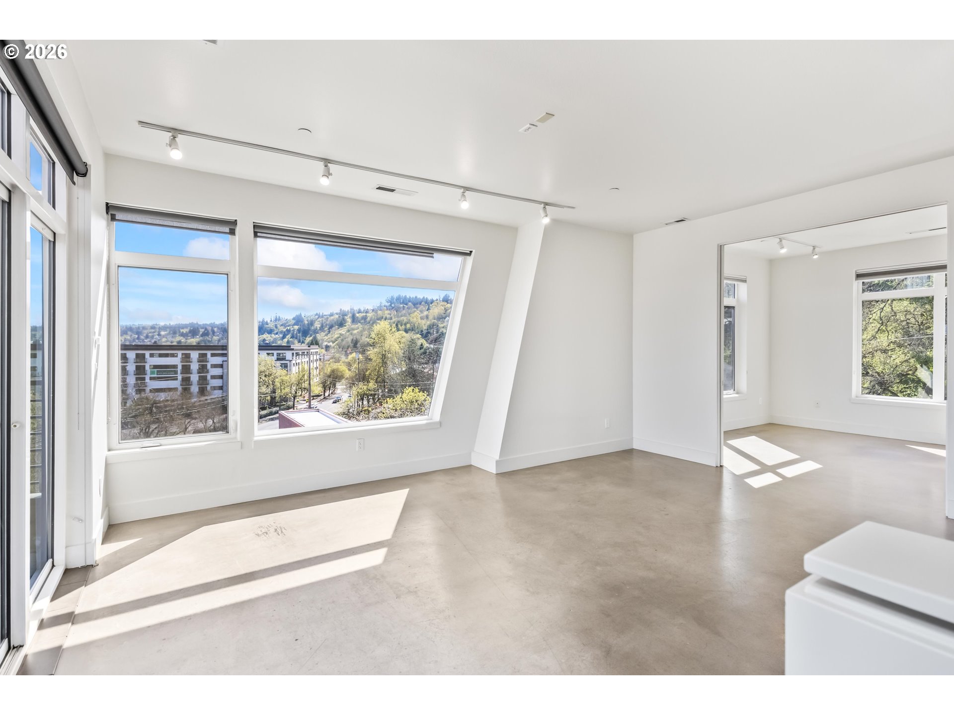 4644 South Kelly Avenue Portland, OR 97239 - Photo 24 of 42 a view of livingroom with furniture window and front door