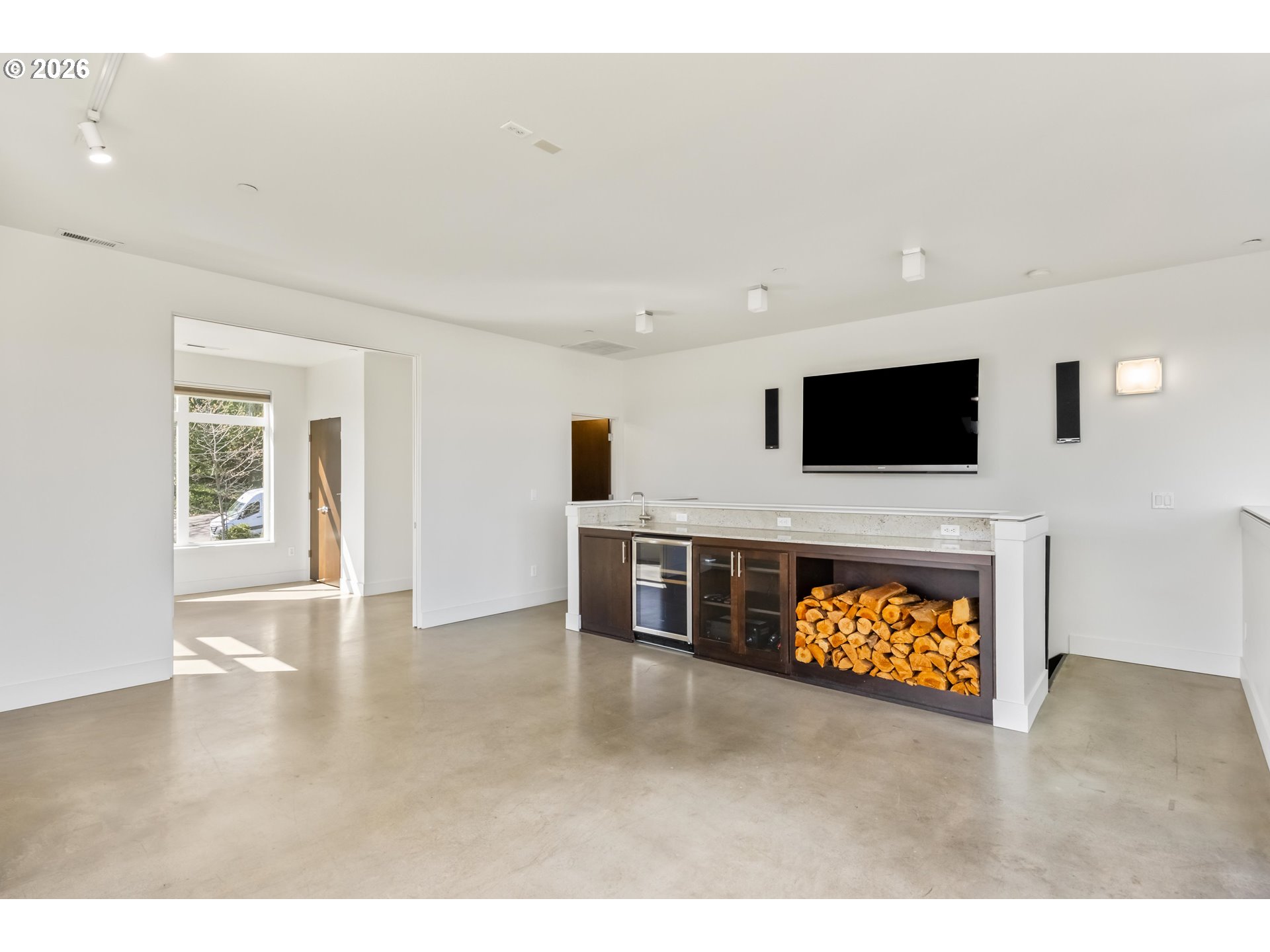 4644 South Kelly Avenue Portland, OR 97239 - Photo 26 of 42 a living room with furniture and a flat screen tv