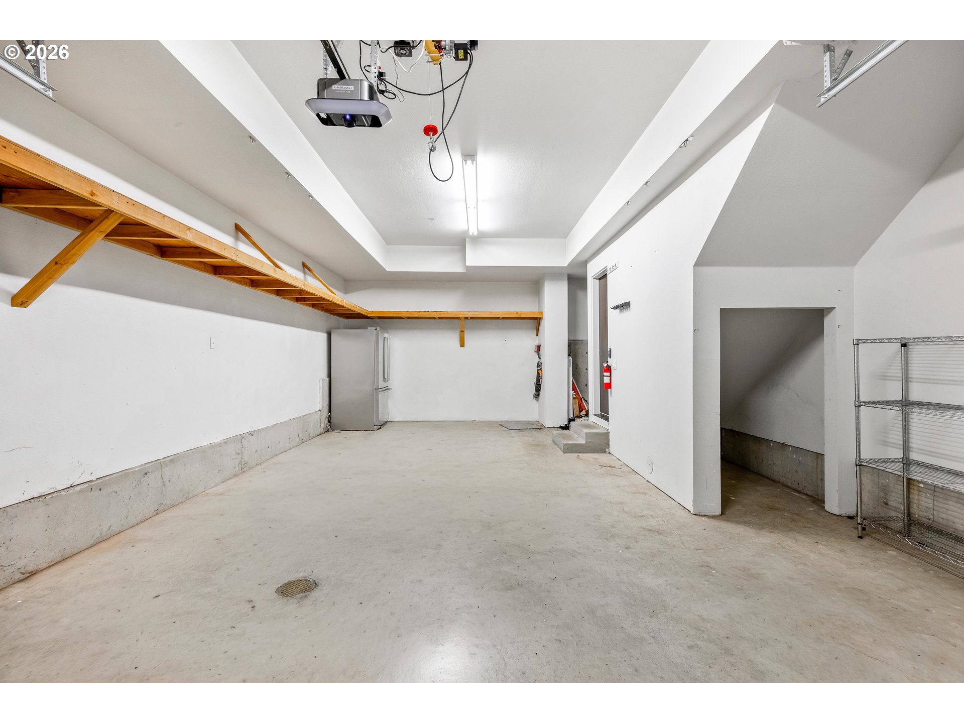4644 South Kelly Avenue Portland, OR 97239 - Photo 36 of 42 a view of a livingroom with a staircase