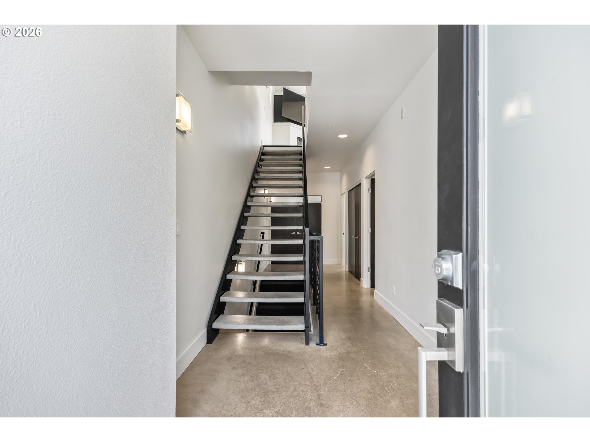 4644 South Kelly Avenue Portland, OR 97239 - Photo 37 of 42 a view of entryway and hall with wooden floor