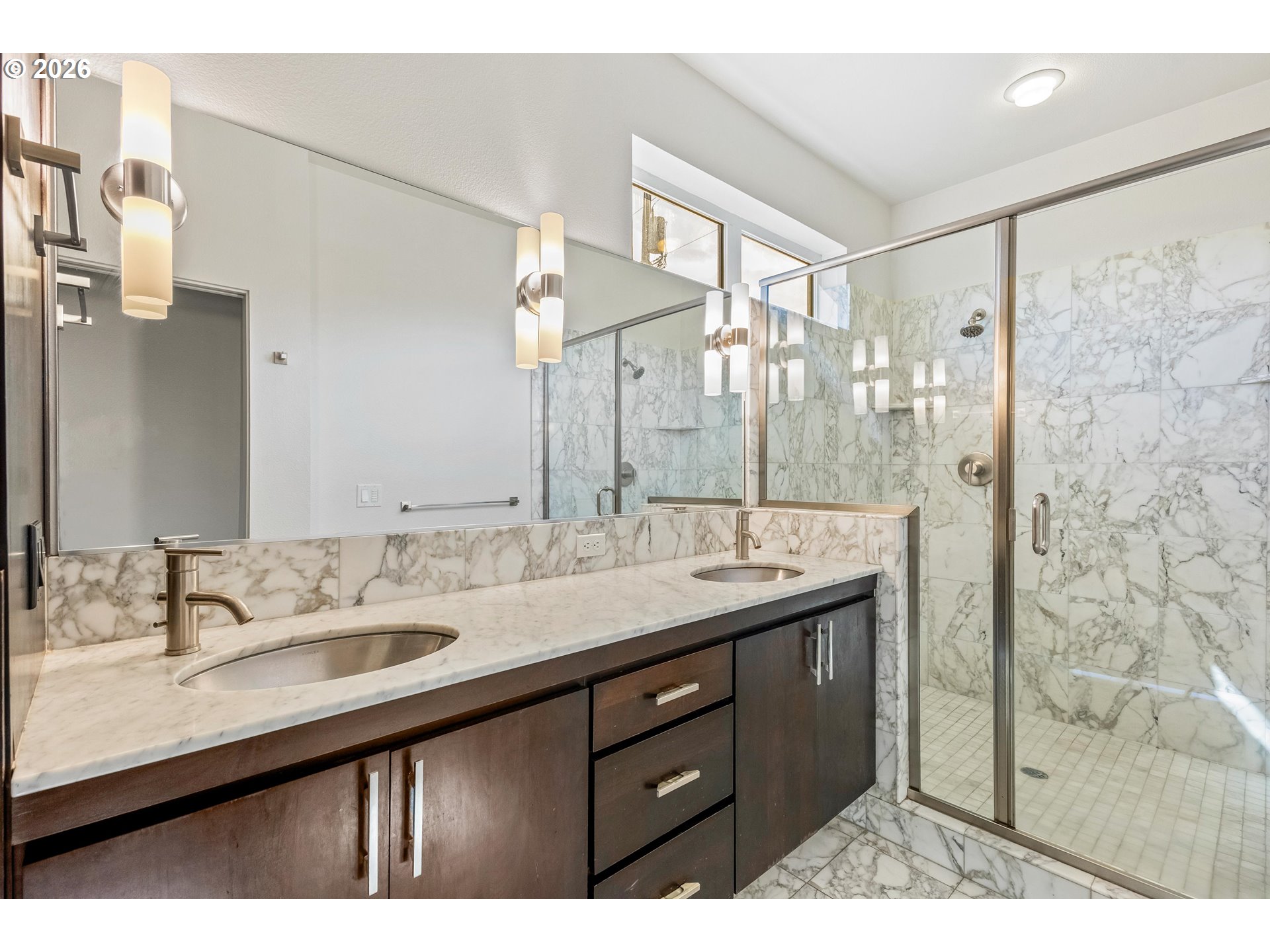4644 South Kelly Avenue Portland, OR 97239 - Photo 4 of 42 a bathroom with a double vanity sink mirror and double