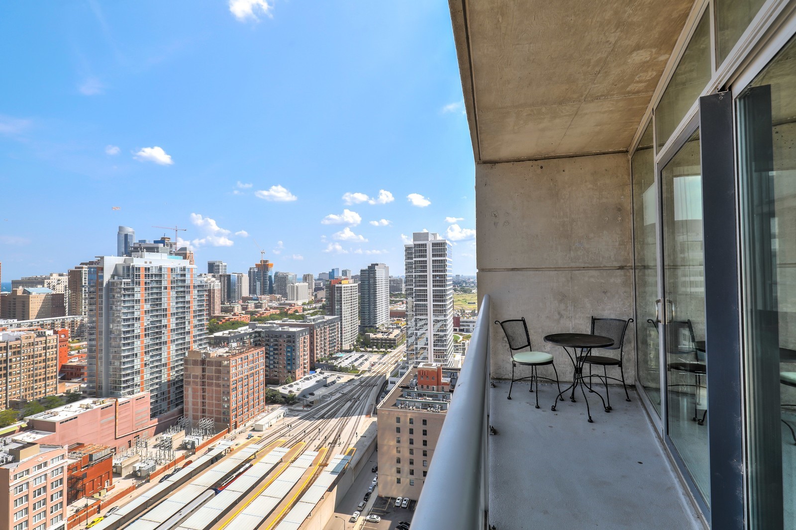611 South Wells Street, Unit 2808 Chicago, IL 60607 - Photo 9 of 16 a view of a terrace with chairs