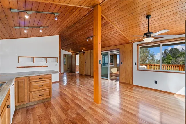 a view of a livingroom with wooden floor