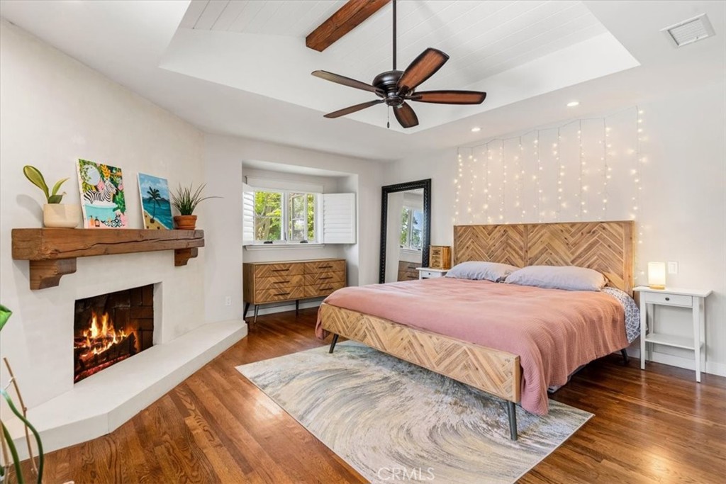 27064 Sunnyridge Road Palos Verdes Peninsula, CA 90274 - Photo 19 of 57 a bedroom with a bed and a fireplace