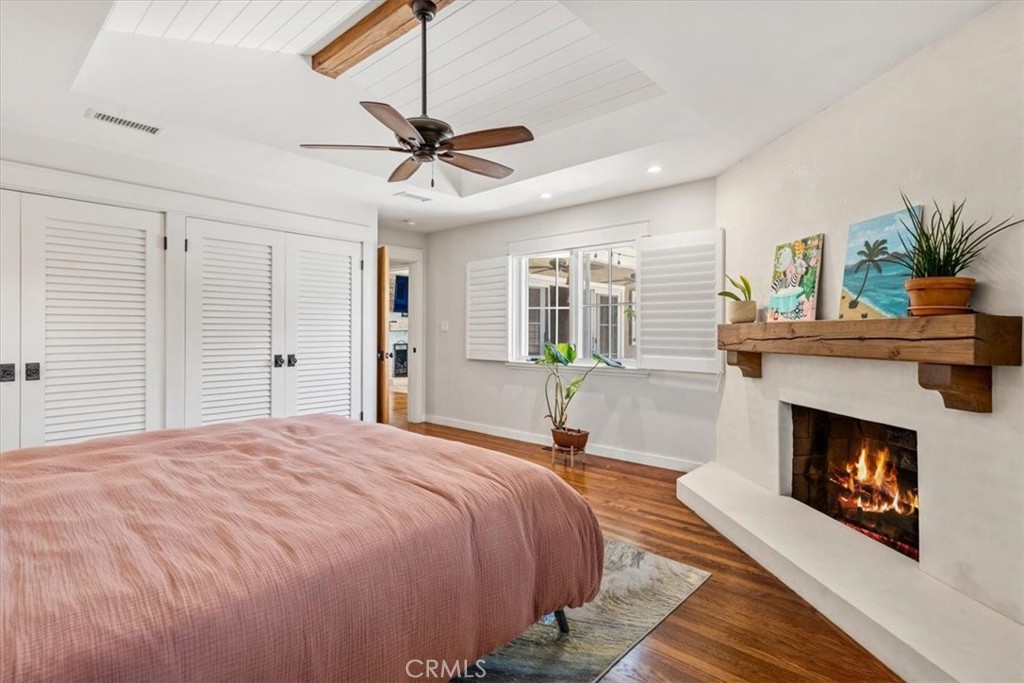 27064 Sunnyridge Road Palos Verdes Peninsula, CA 90274 - Photo 21 of 57 a bedroom with a bed and a fireplace