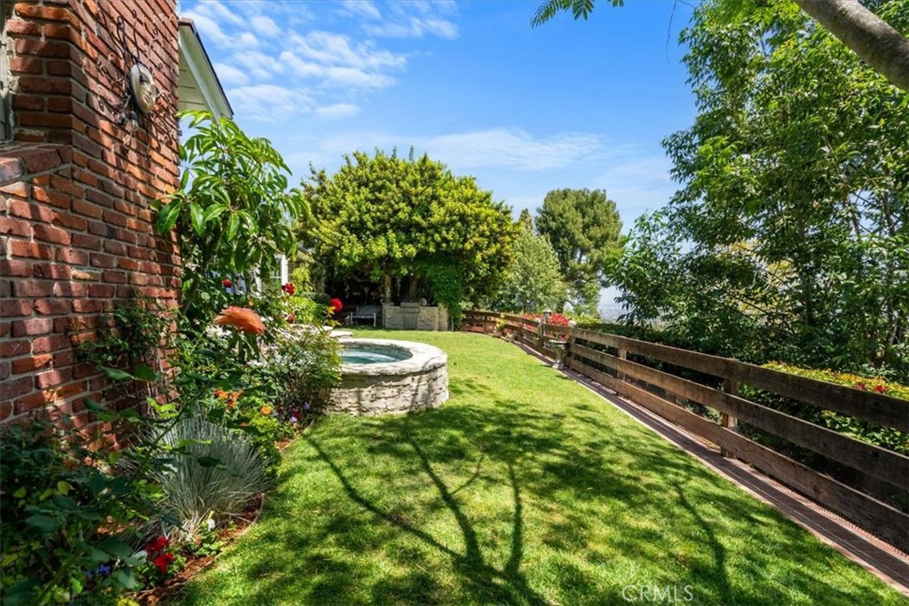 27064 Sunnyridge Road Palos Verdes Peninsula, CA 90274 - Photo 40 of 57 a view of a backyard with sitting area