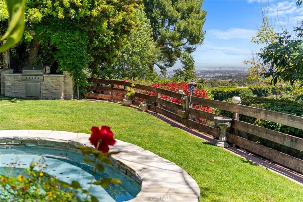 27064 Sunnyridge Road Palos Verdes Peninsula, CA 90274 - Photo 41 of 57 a view of a backyard with wooden fence