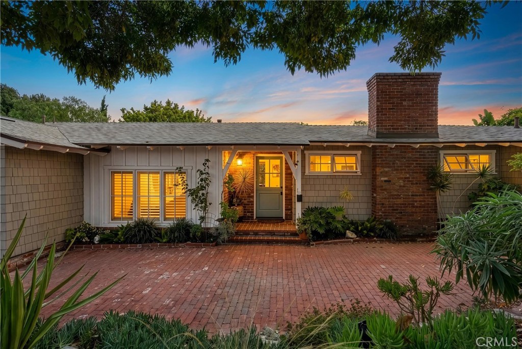 27064 Sunnyridge Road Palos Verdes Peninsula, CA 90274 - Photo 45 of 57 a front view of a house with garden