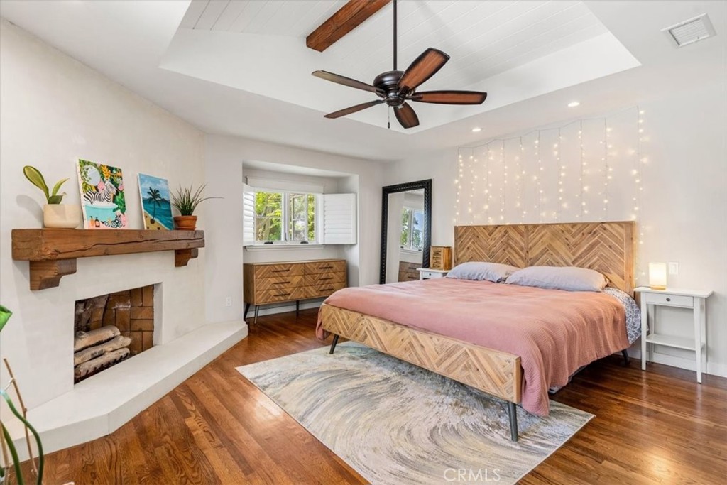 27064 Sunnyridge Road Palos Verdes Peninsula, CA 90274 - Photo 55 of 57 a bedroom with a bed and a fireplace