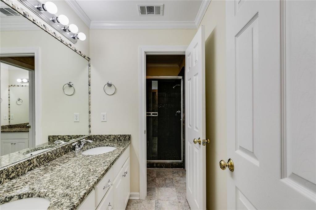 110 Pond View Point LaGrange, GA 30240 - Photo 47 of 68 a bathroom with a granite countertop sink and a mirror
