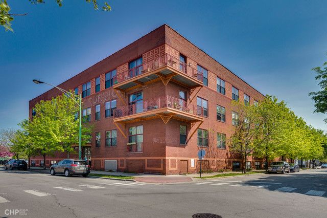a front view of a building with street