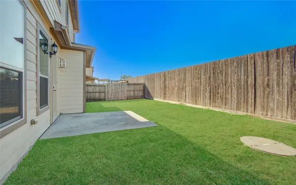 a view of backyard with a barn