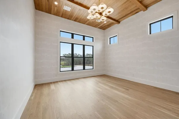 a view of livingroom with window ceiling fan and hardwood floor