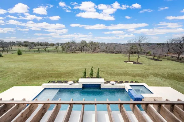 a view of a lake from a balcony
