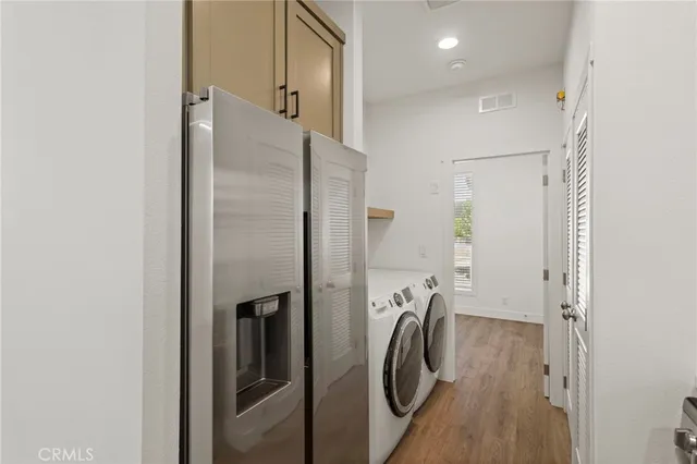 a kitchen with stainless steel appliances granite countertop a stove and a microwave