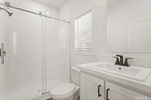 a bathroom with a sink toilet and bathtub