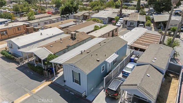 an aerial view of a city with lots of residential buildings