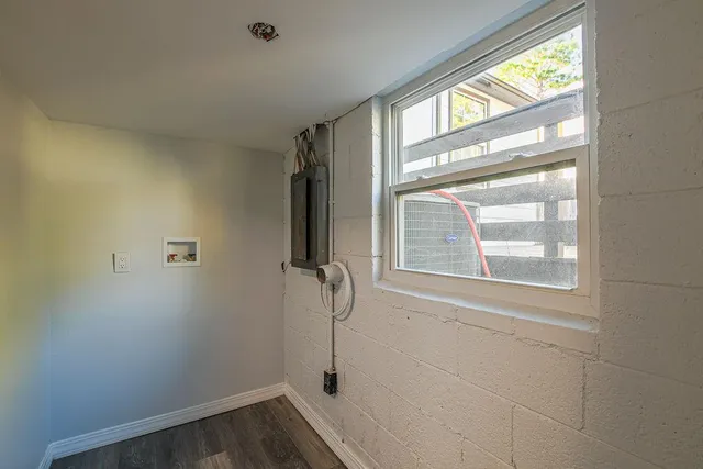 a view of empty room with windows