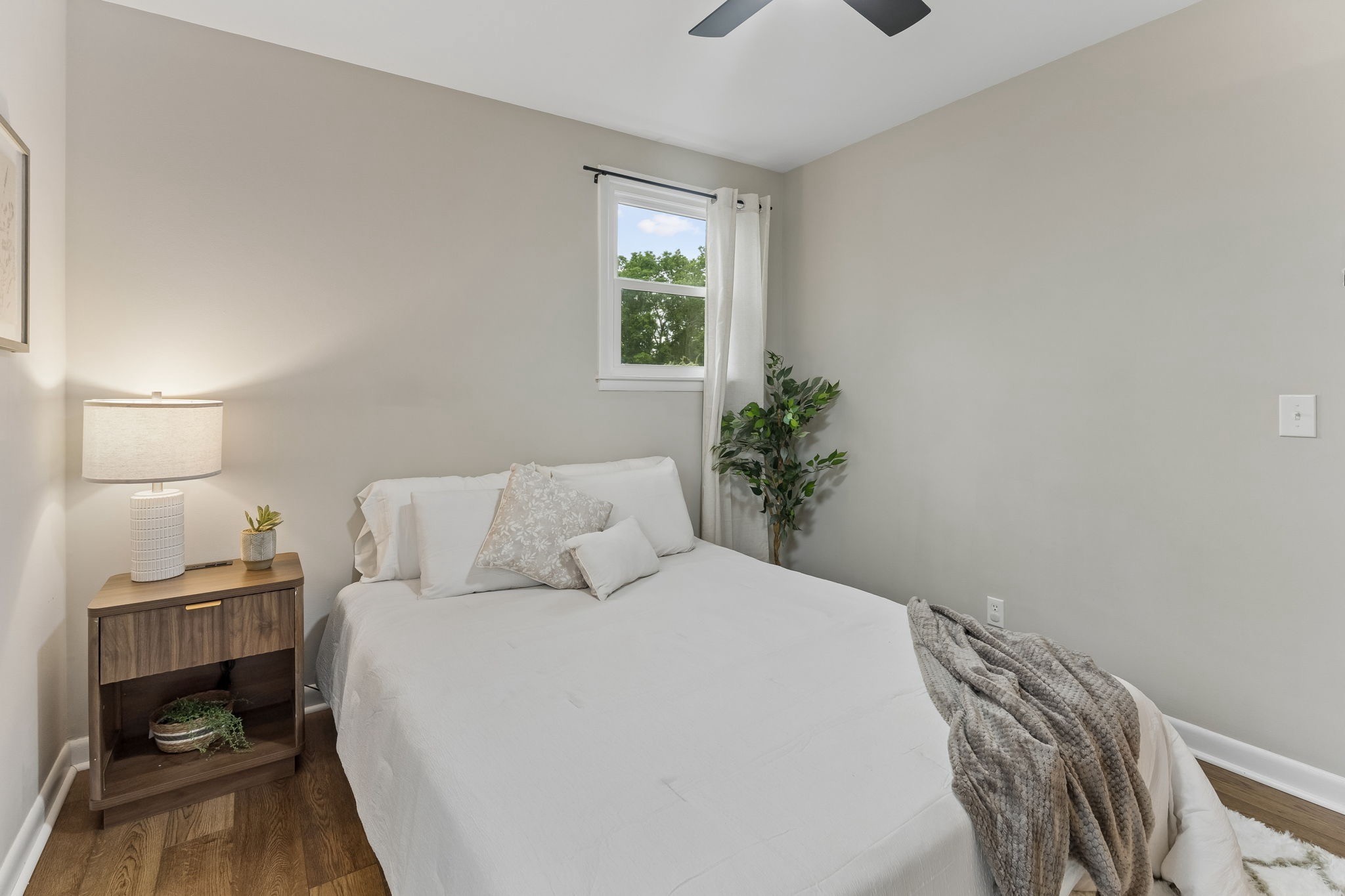 3908 Cedar Street Centerville, TN 37033 - Photo 24 of 31 a bedroom with a bed and a window