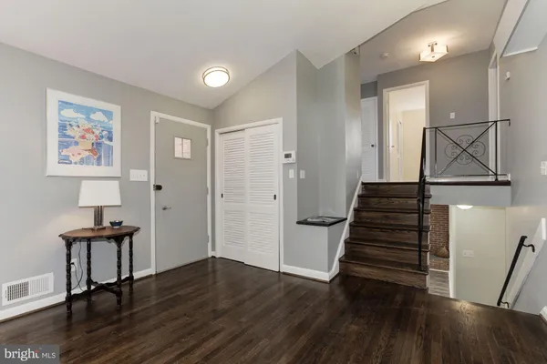 a view of entryway with wooden floor