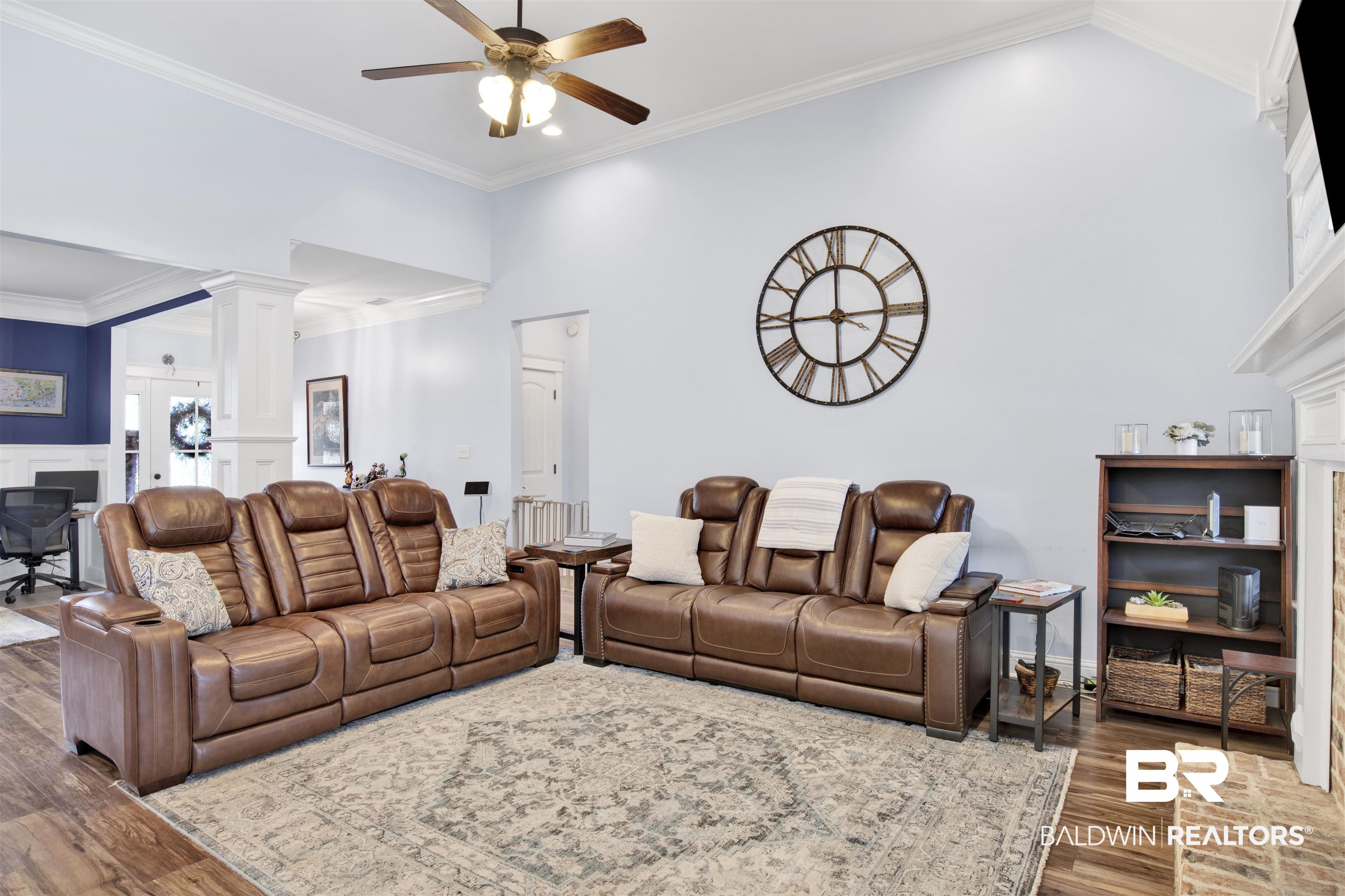 12418 Cambron Trail Daphne, AL 36527 - Photo 19 of 44 Living room featuring ceiling fan, hardwood / wood-style flooring, ornamental molding, and ornate columns
