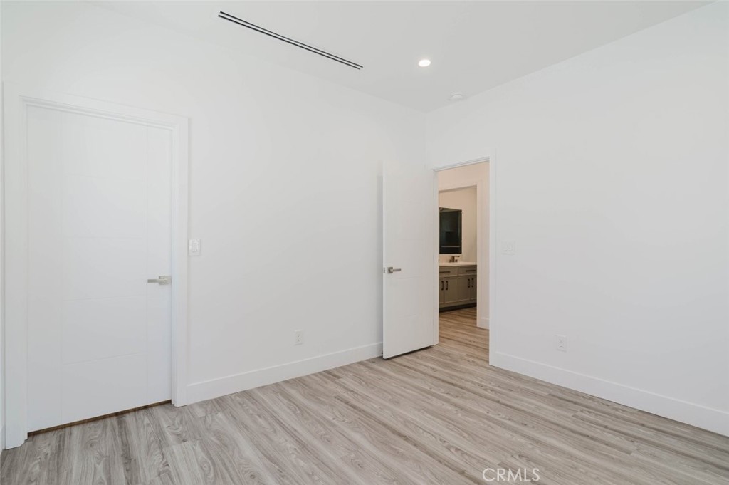 17846 Rinaldi Street Granada Hills, CA 91344 - Photo 17 of 34 a view of a livingroom with wooden floor