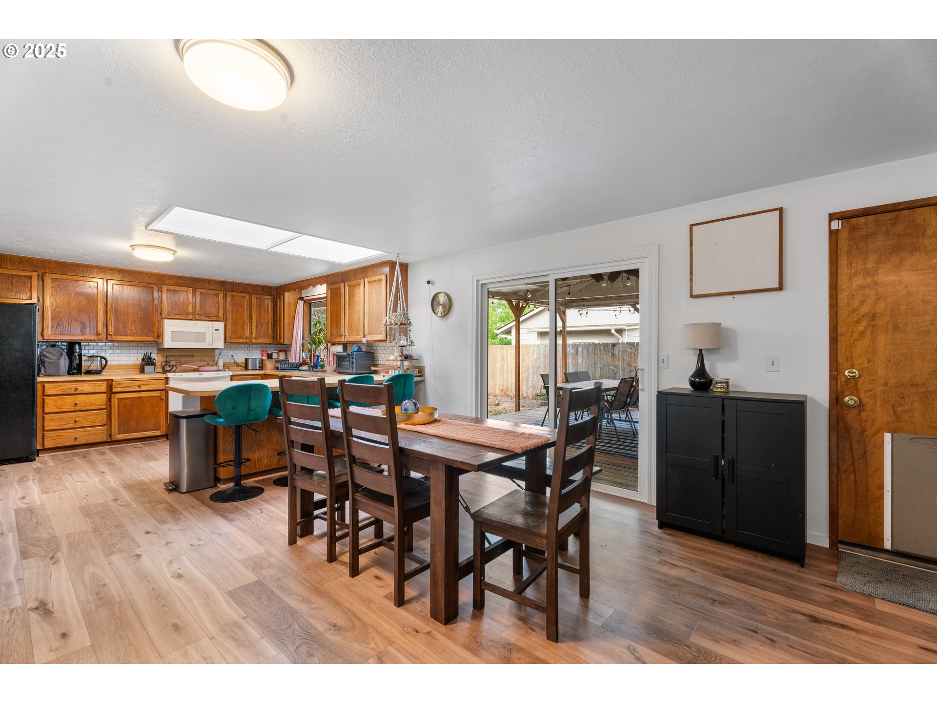 2356 B Street Hubbard, OR 97032 - Photo 13 of 32 a view of a dining room with furniture and window