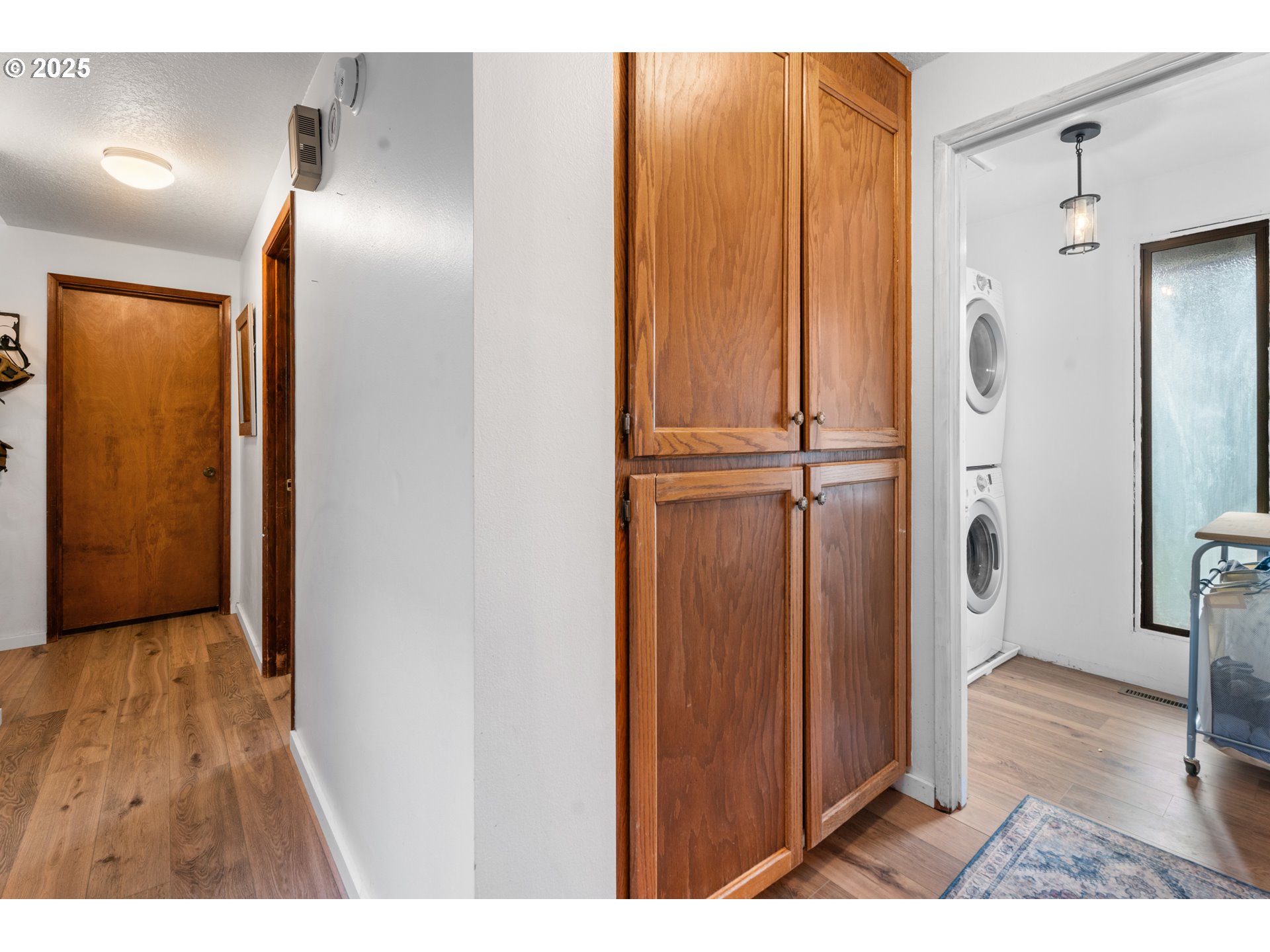 2356 B Street Hubbard, OR 97032 - Photo 19 of 32 a view of a hallway with wooden floor