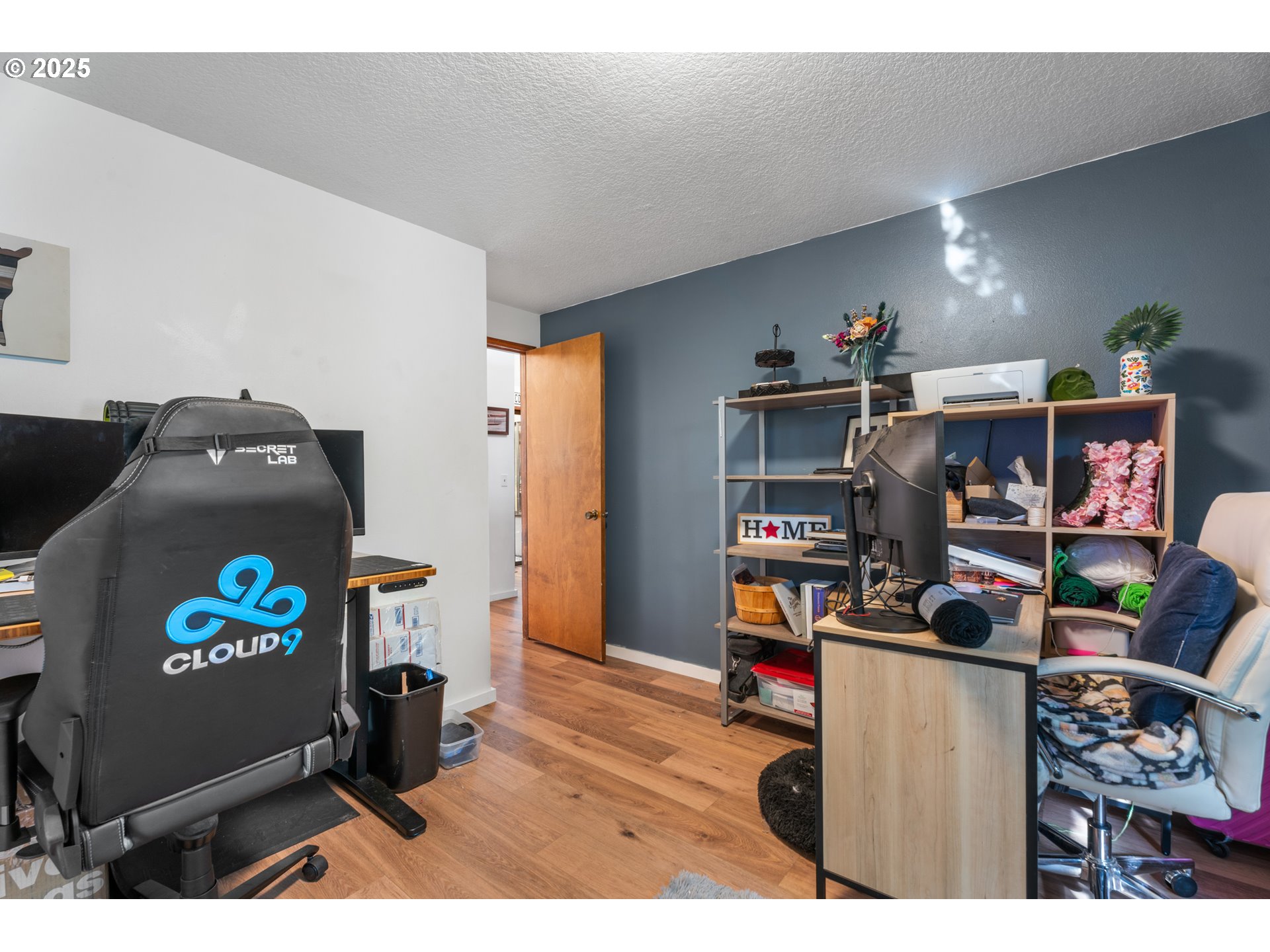 2356 B Street Hubbard, OR 97032 - Photo 23 of 32 a living room with furniture and a flat screen tv