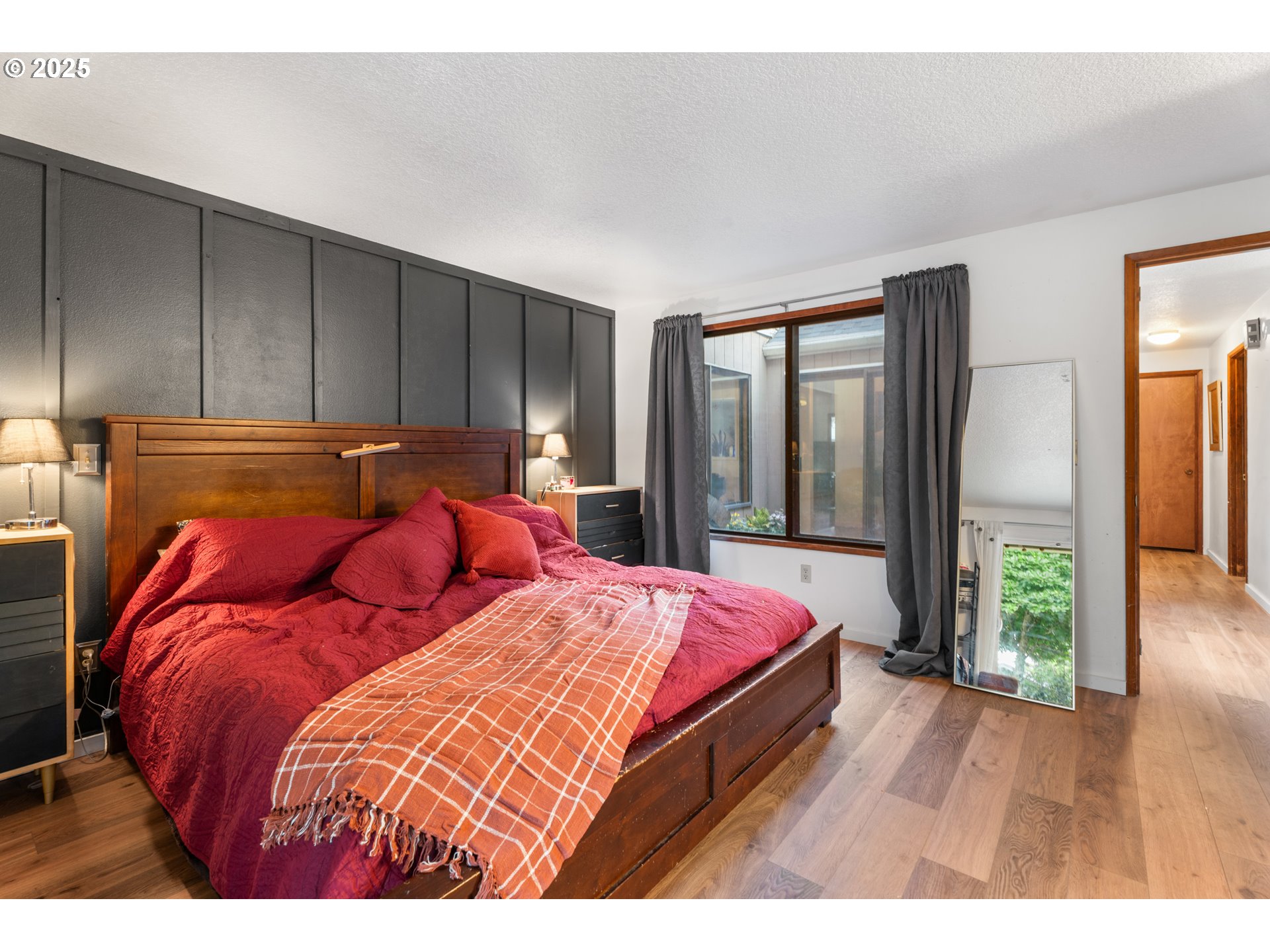 2356 B Street Hubbard, OR 97032 - Photo 25 of 32 a bed sitting in a bedroom next to a window