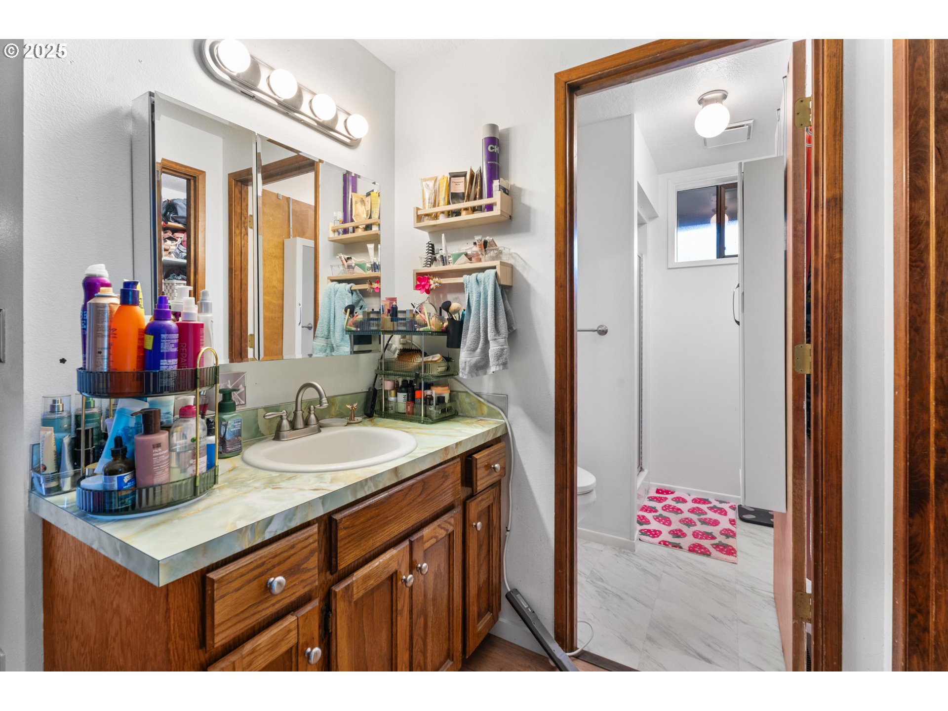2356 B Street Hubbard, OR 97032 - Photo 27 of 32 a bathroom with a sink vanity and a mirror
