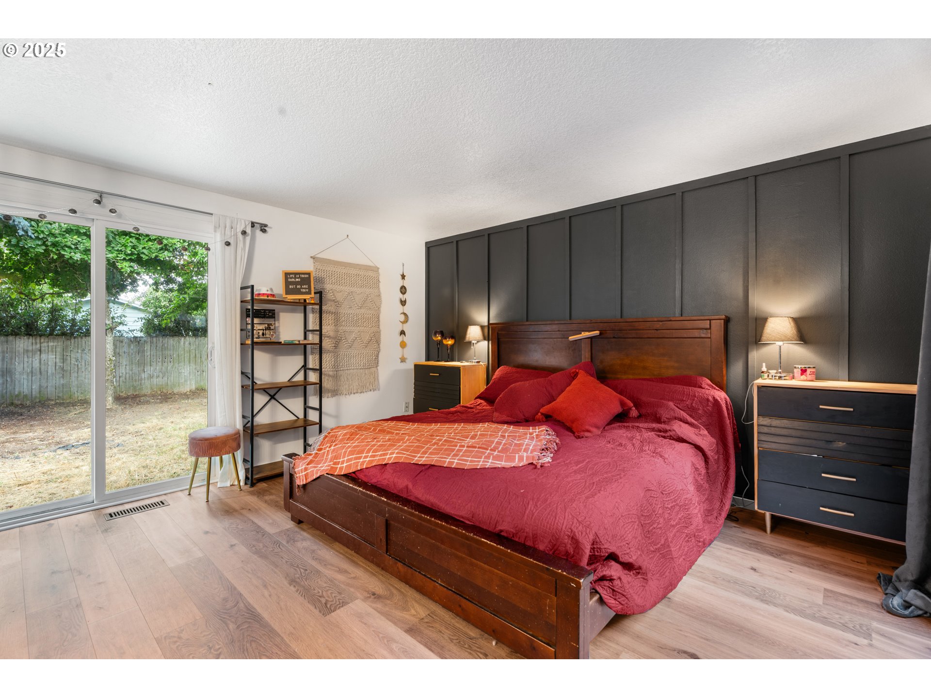2356 B Street Hubbard, OR 97032 - Photo 29 of 32 a bedroom with a bed and wooden floor