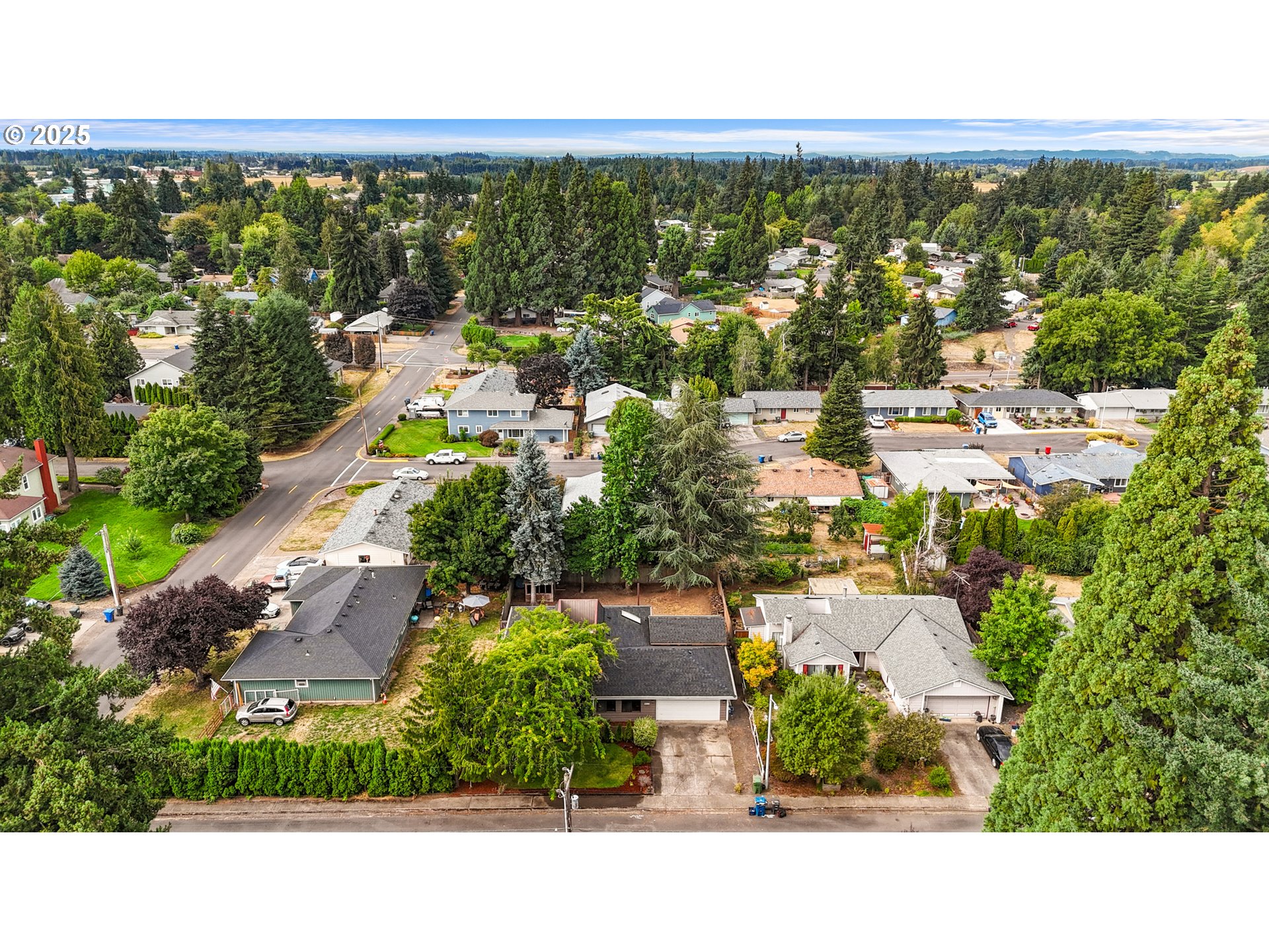 2356 B Street Hubbard, OR 97032 - Photo 3 of 32 an aerial view of residential building and lake