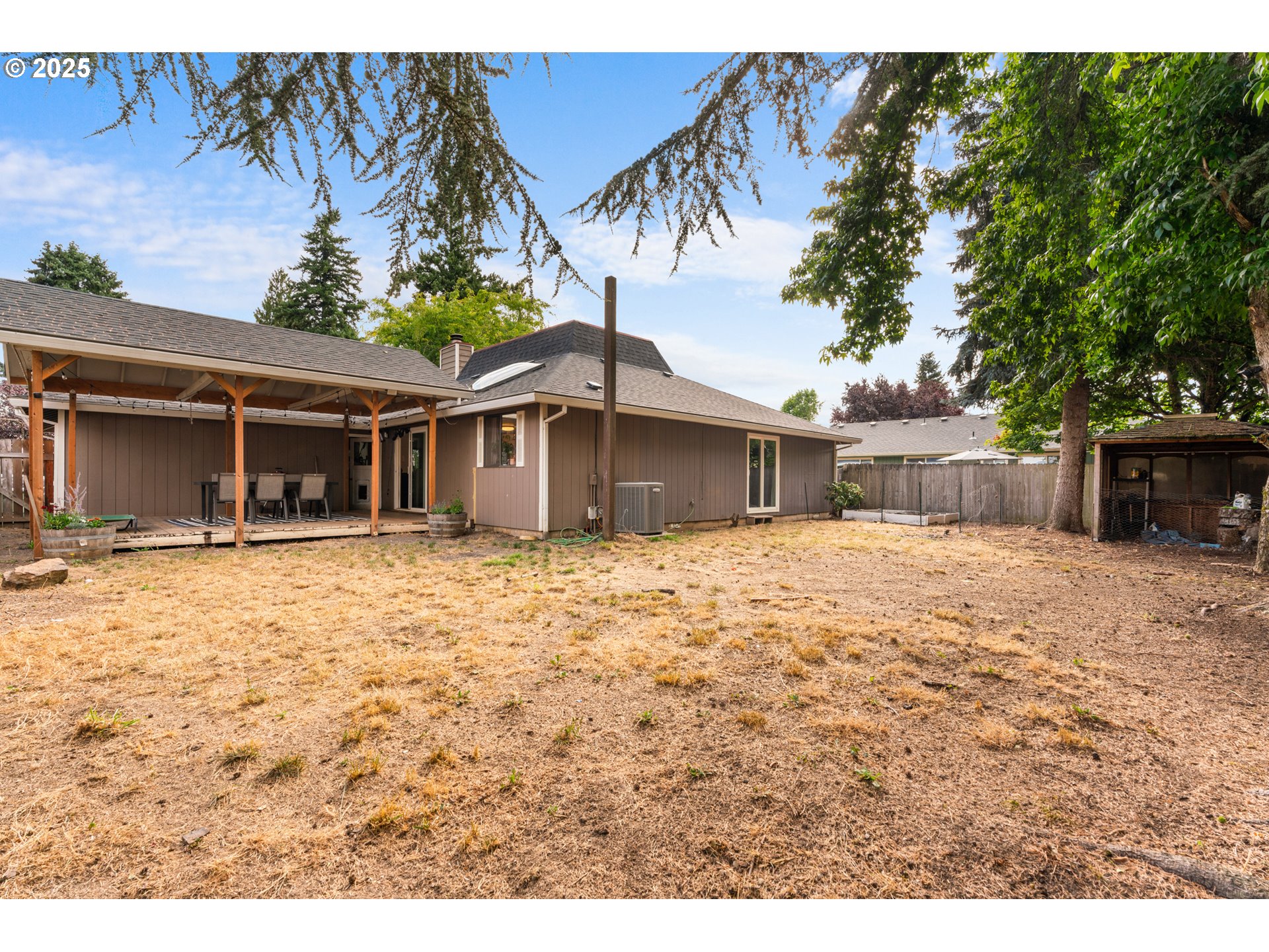 2356 B Street Hubbard, OR 97032 - Photo 31 of 32 a house with trees in the background