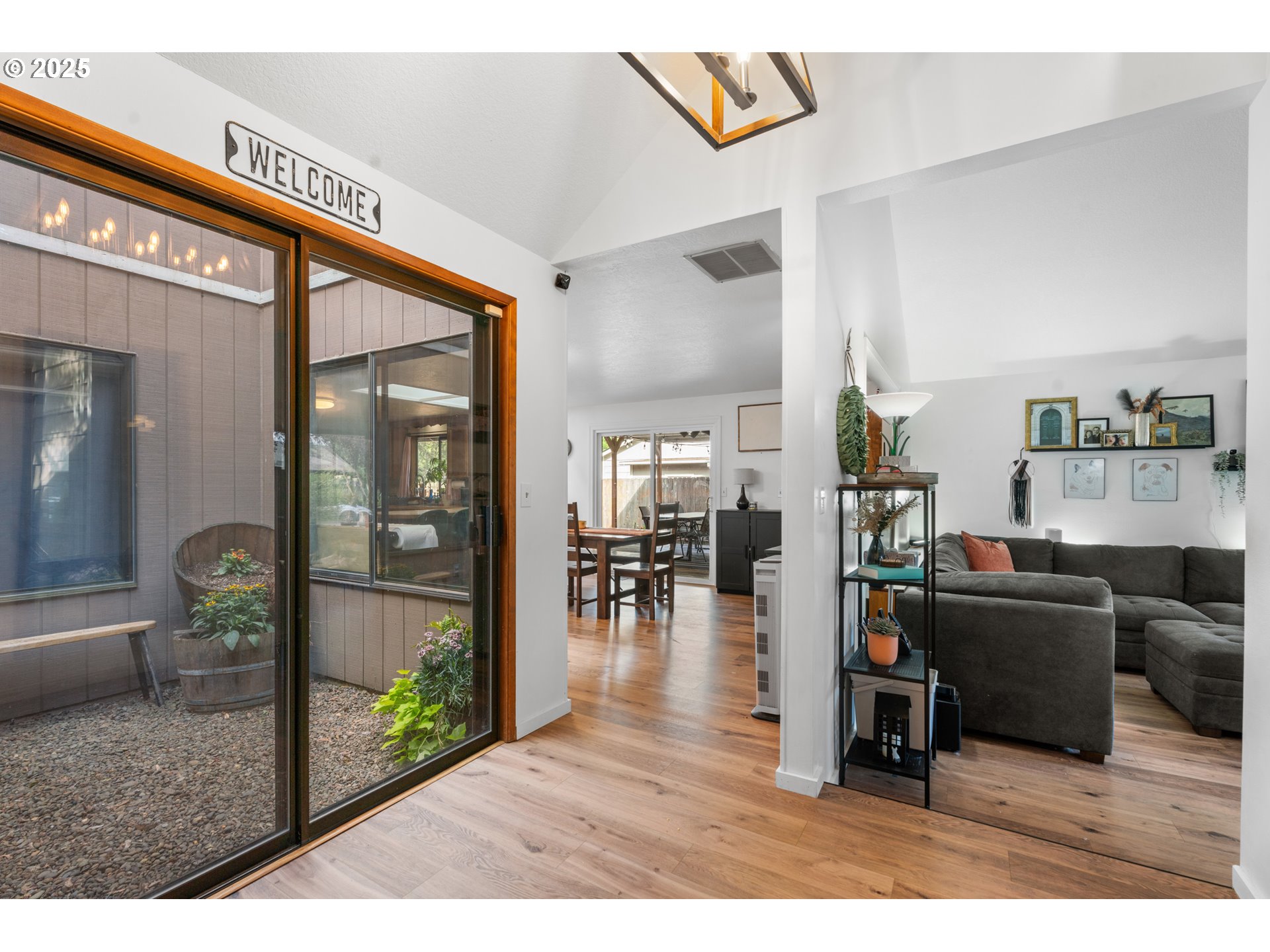 2356 B Street Hubbard, OR 97032 - Photo 8 of 32 a living room with furniture and a wooden floor