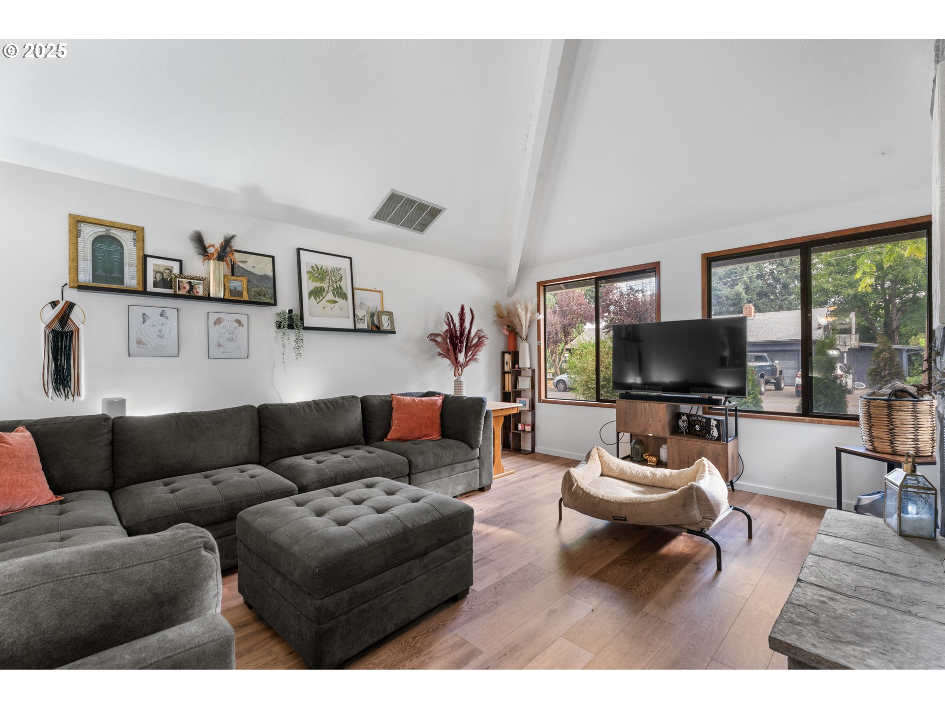 2356 B Street Hubbard, OR 97032 - Photo 9 of 32 a living room with furniture and a flat screen tv